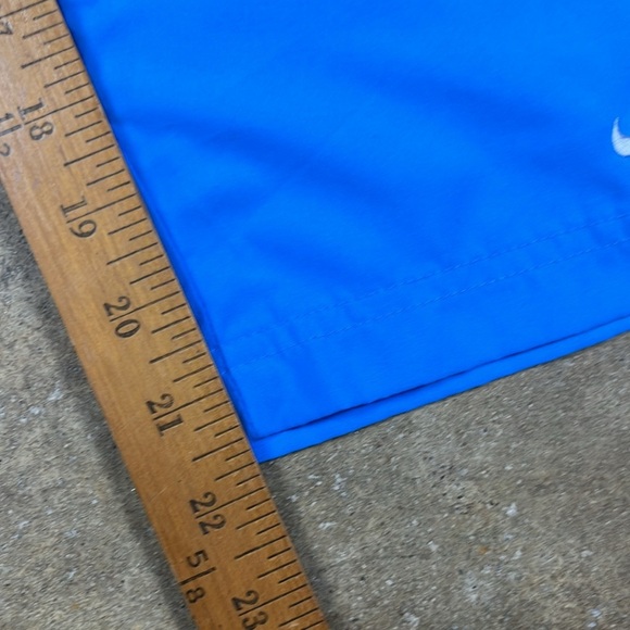 Vintage Nike Cropped Blue Pants with Orange and White Stripes
Size: small - Picture 7 of 7